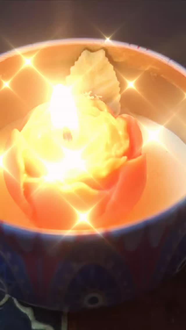 Hand-poured candle in a glowing bowl